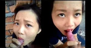 Bạn gái liếm dương vật ở vườn sau nhà